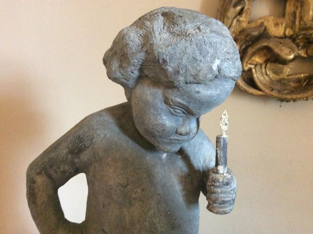 A small late 19thC lead cherub garden feature View II
