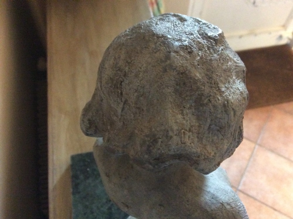 A small late 19thC lead cherub garden feature View V