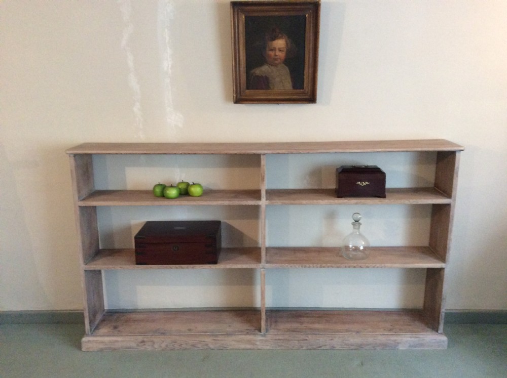 A limed pine double open bookcase View II