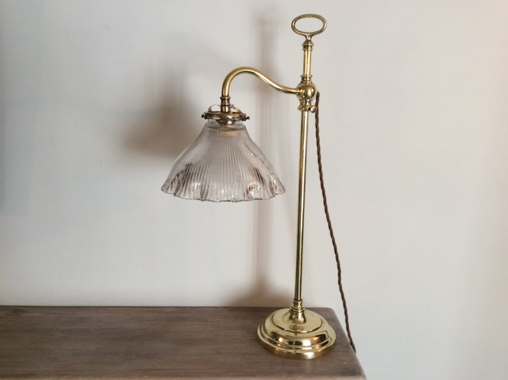 An Edwardian adjustable brass reading lamp