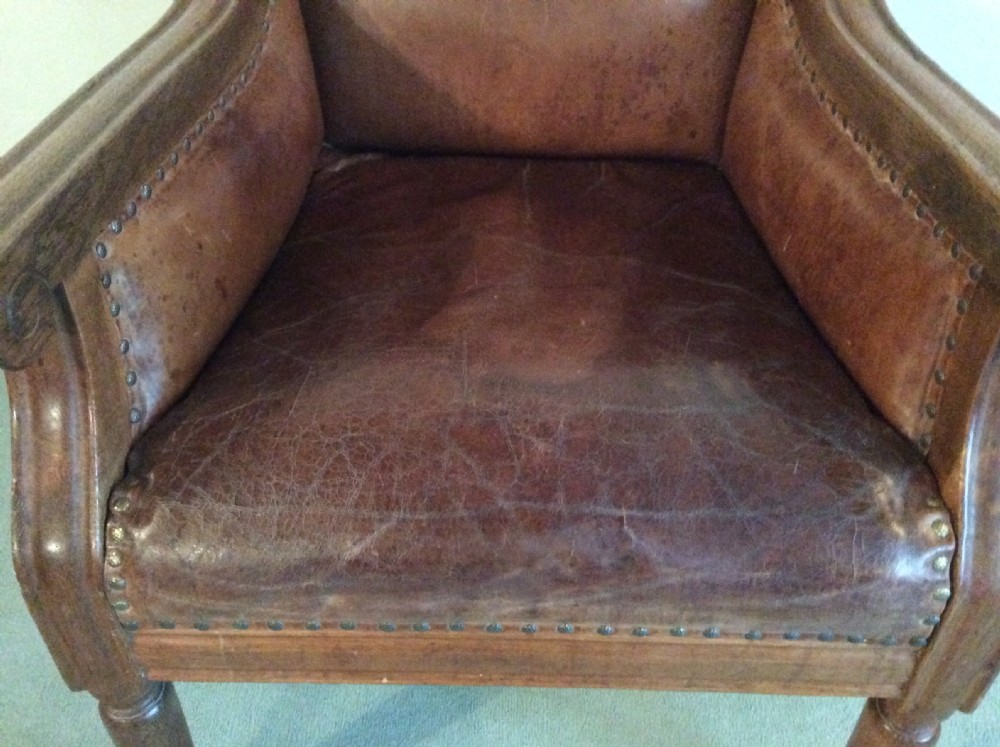 A leather covered throne chair View III