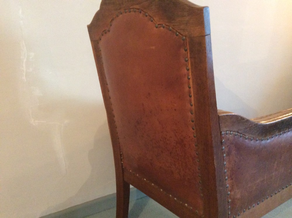 A leather covered throne chair View VIII