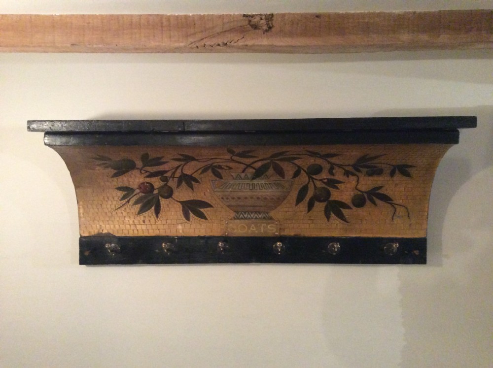 An early 20thC gilded coat hook rail