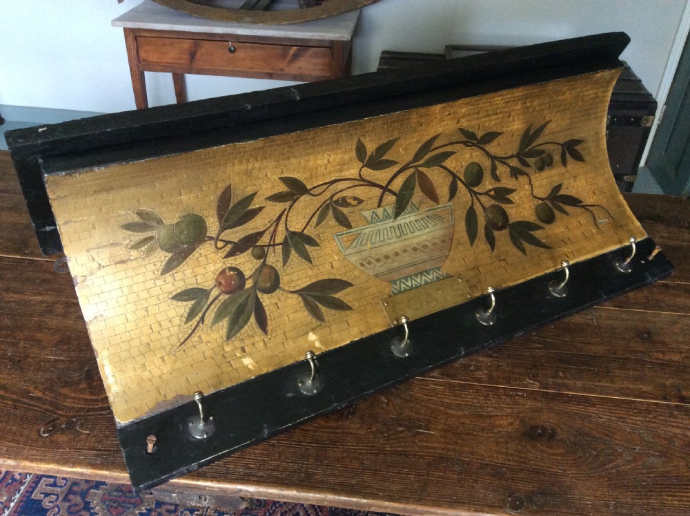 An early 20thC gilded coat hook rail View II