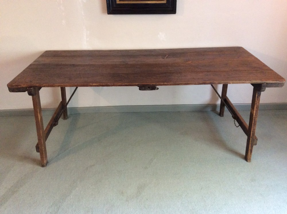 A French folding trestle dining table