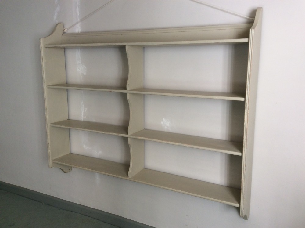 A set of 19thC painted wall shelves View II
