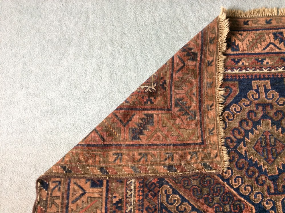 An antique rug 172 x 140 cm View X