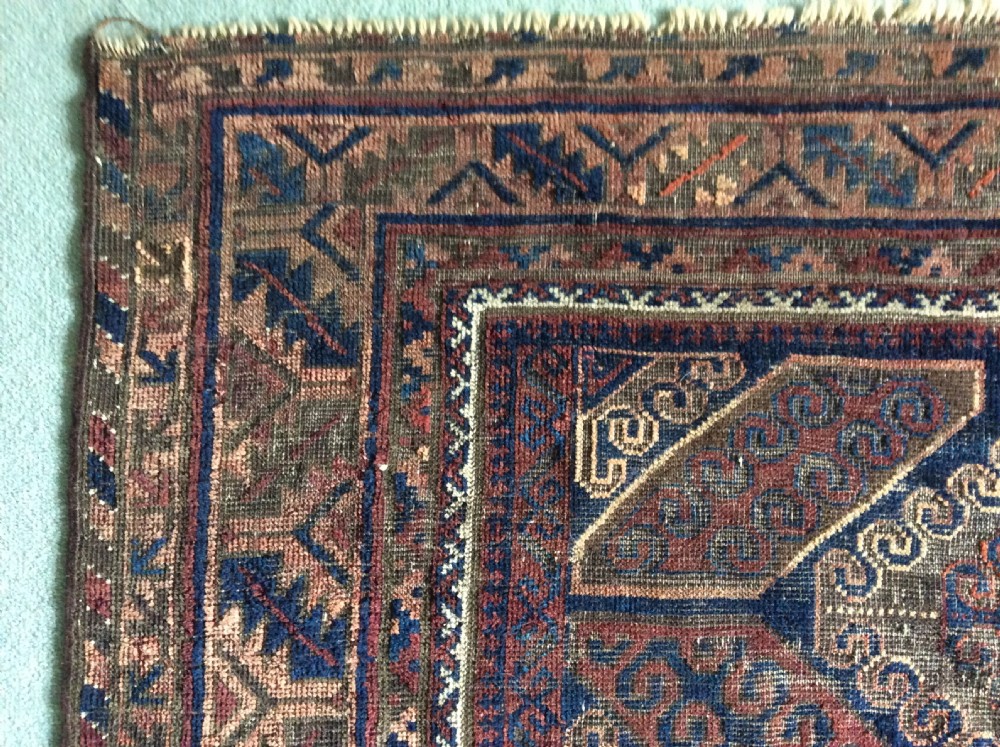 An antique rug 172 x 140 cm View XII