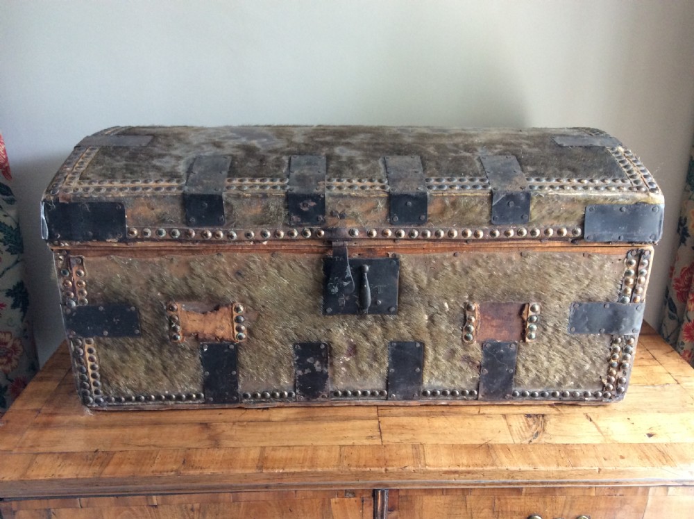 An 18thC dome top travelling trunk