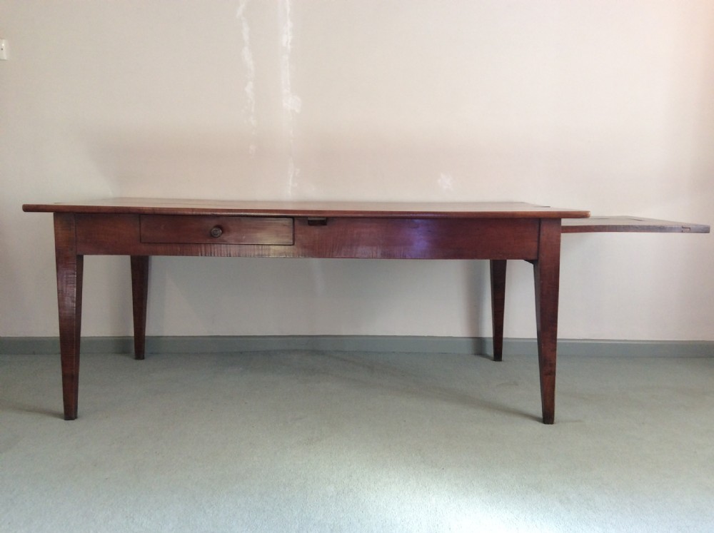 A fine all cherry French farm house dining table