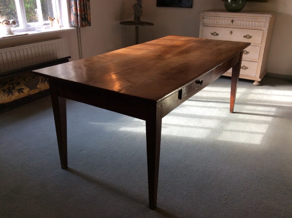 A fine all cherry French farm house dining table View II