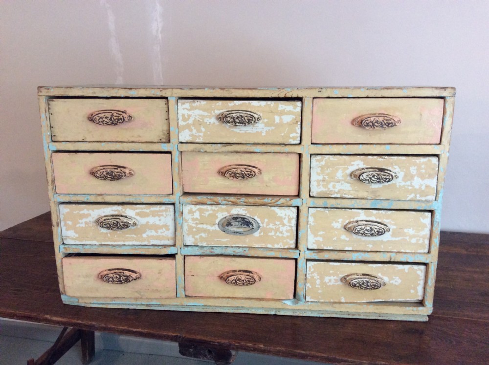 A bank of 12 drawers