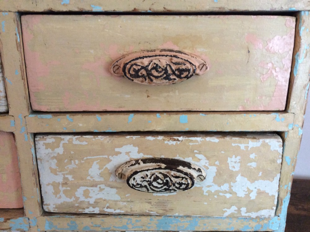 A bank of 12 drawers View II