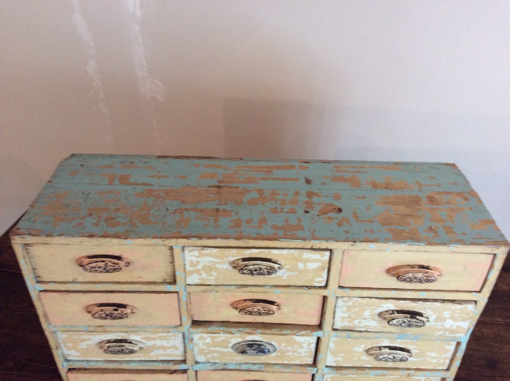 A bank of 12 drawers View III