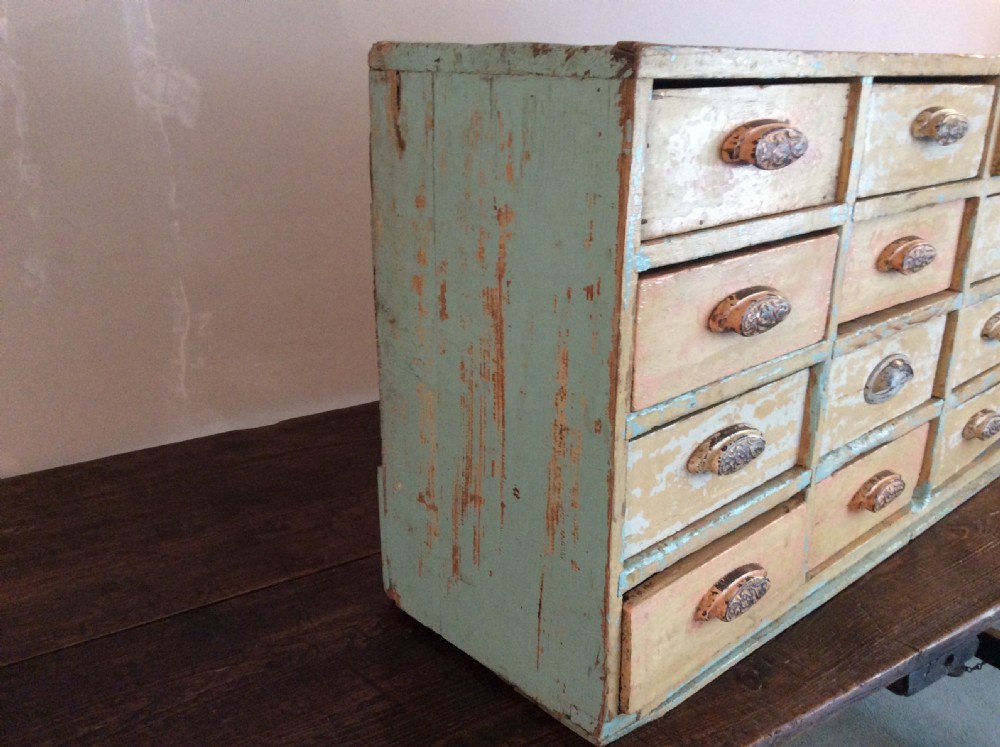 A bank of 12 drawers View VI