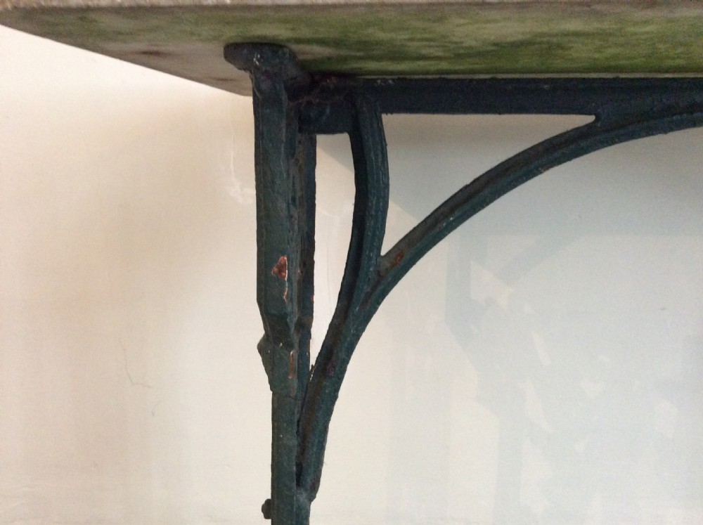 A 19thC cast iron based garden table View VIII