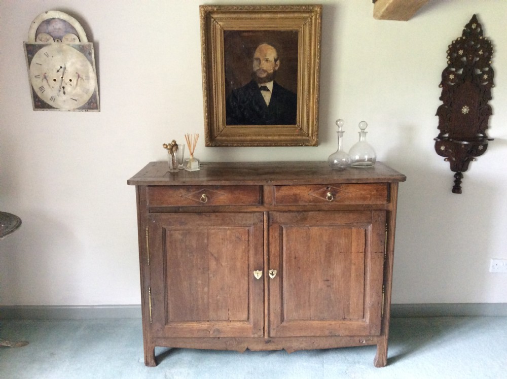 A 19thC French oak and elm buffet View II