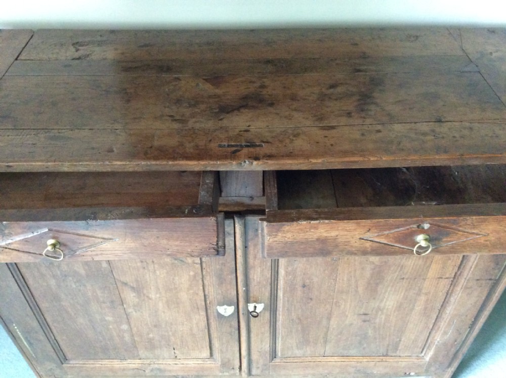 A 19thC French oak and elm buffet View IX