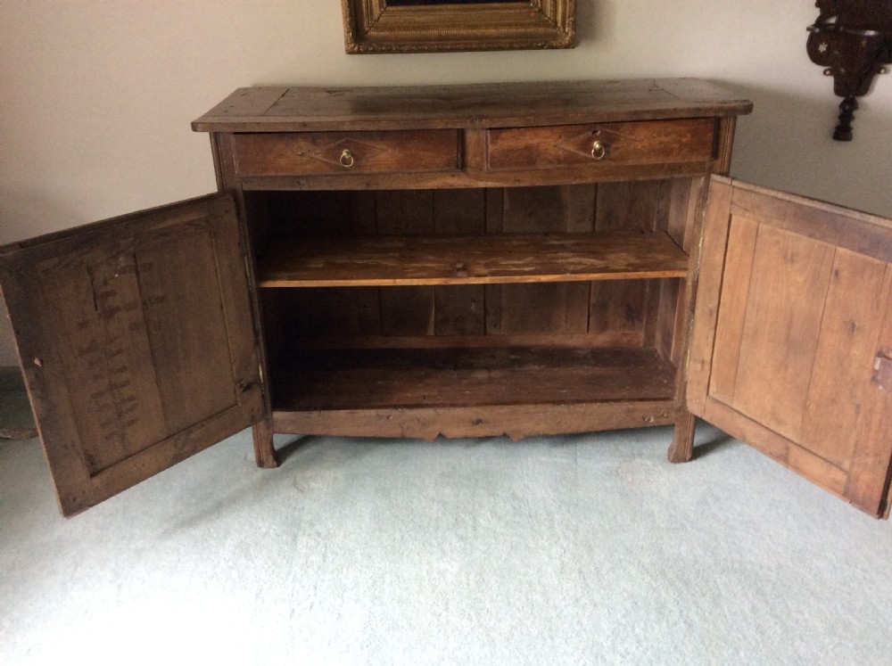 A 19thC French oak and elm buffet View X