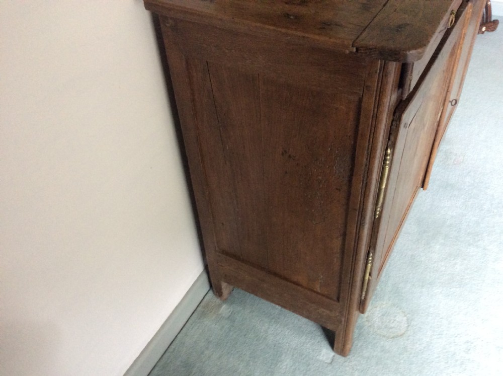 A 19thC French oak and elm buffet View XV