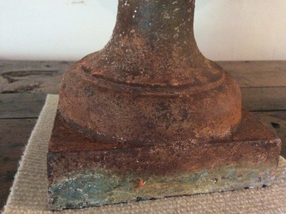 A pair of 19thC cast iron urns View VII