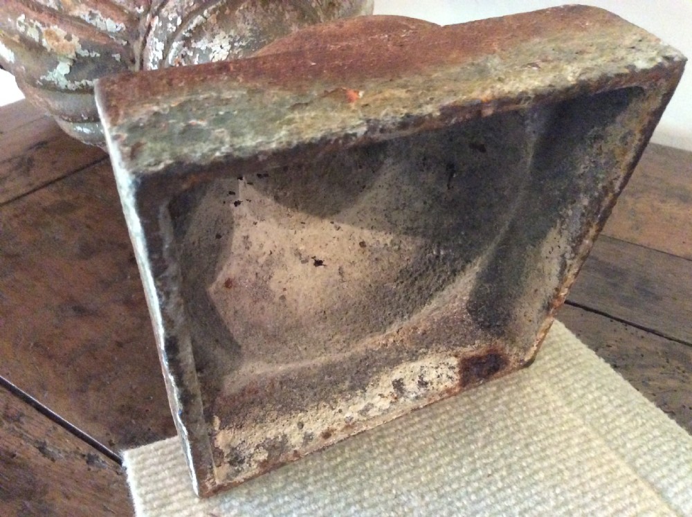 A pair of 19thC cast iron urns View X
