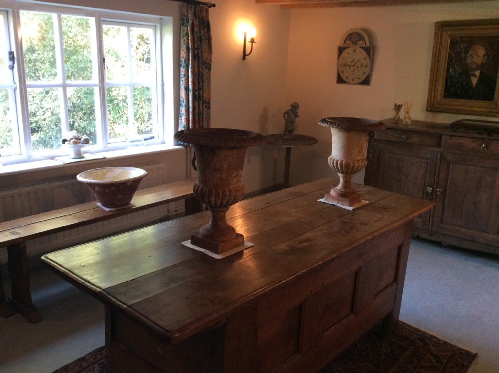 A pair of 19thC cast iron urns View XI