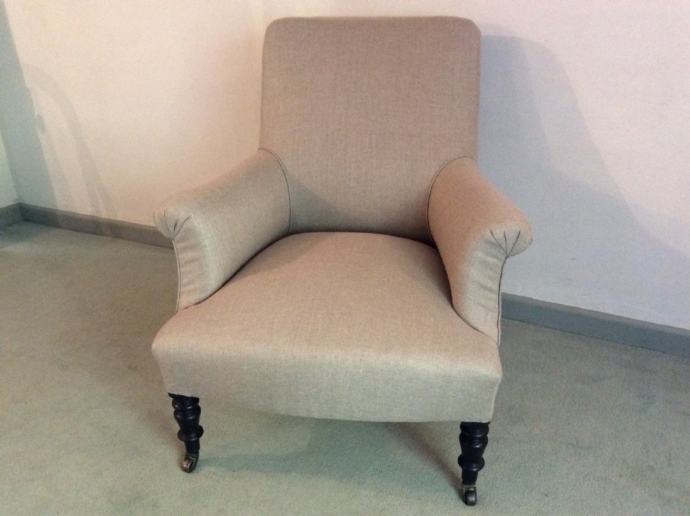 A French upholstered armchair