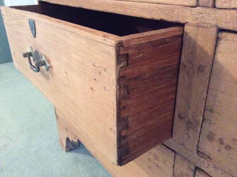 A 19thC Colonial faded teak chest of 6 drawers View VI