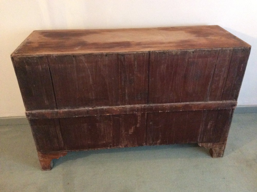A 19thC Colonial faded teak chest of 6 drawers View XII