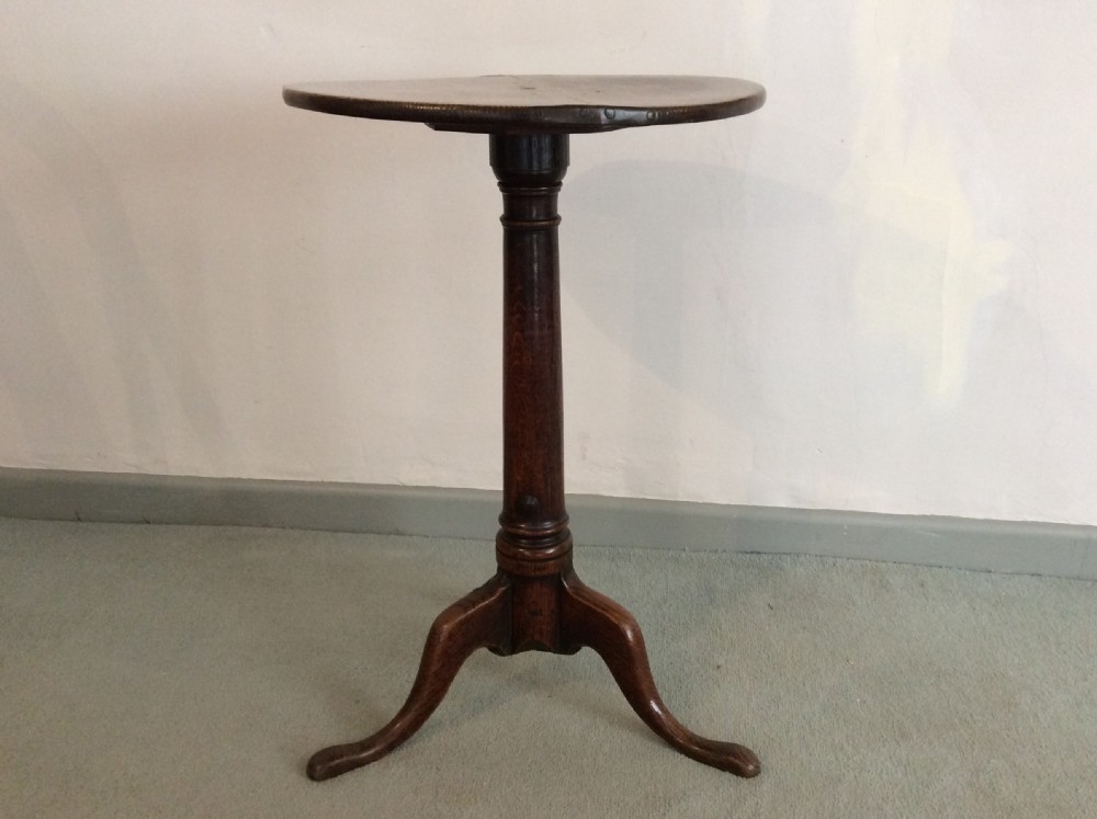 A small country made George III oak tripod table