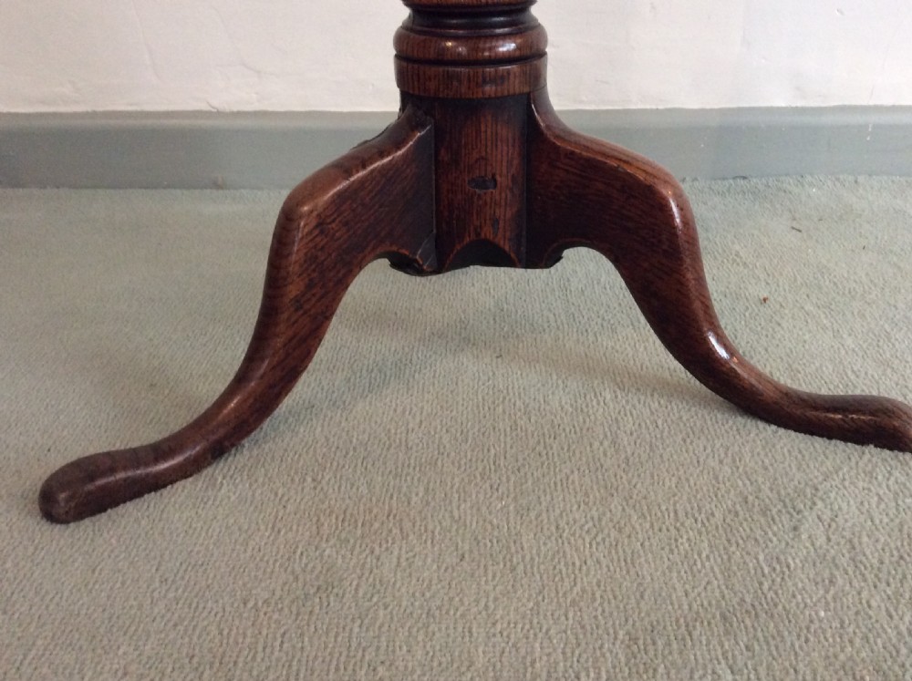A small country made George III oak tripod table View III