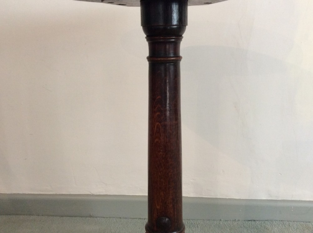 A small country made George III oak tripod table View IV