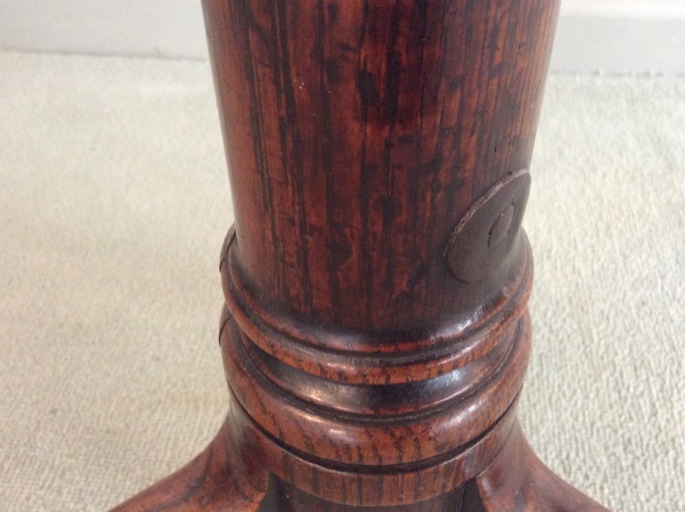A small country made George III oak tripod table View VI