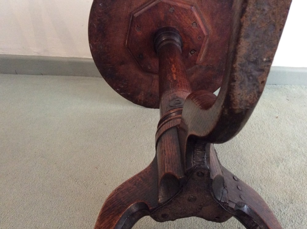 A small country made George III oak tripod table View VIII