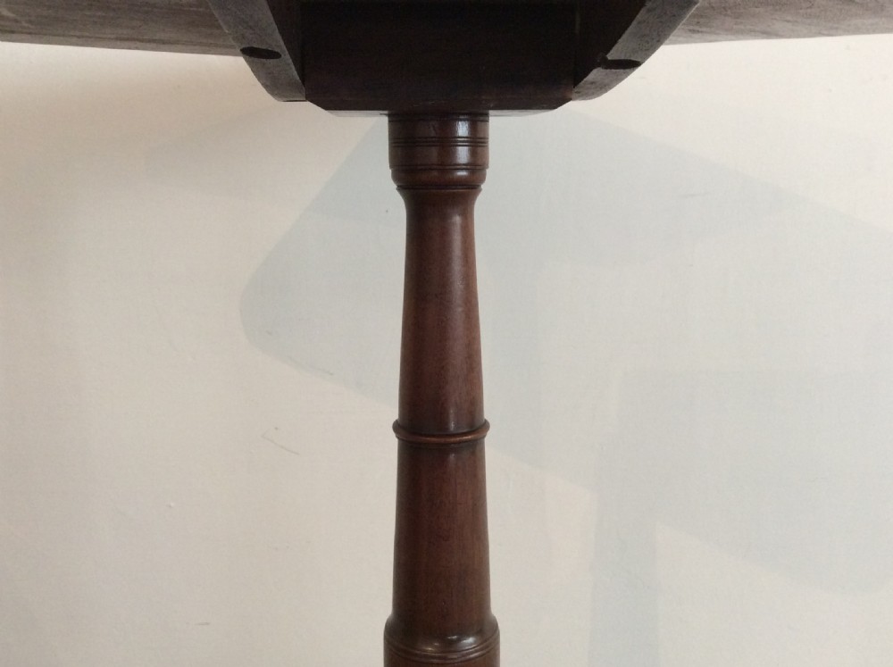 A late Georgian tilt top tripod wine table View IV