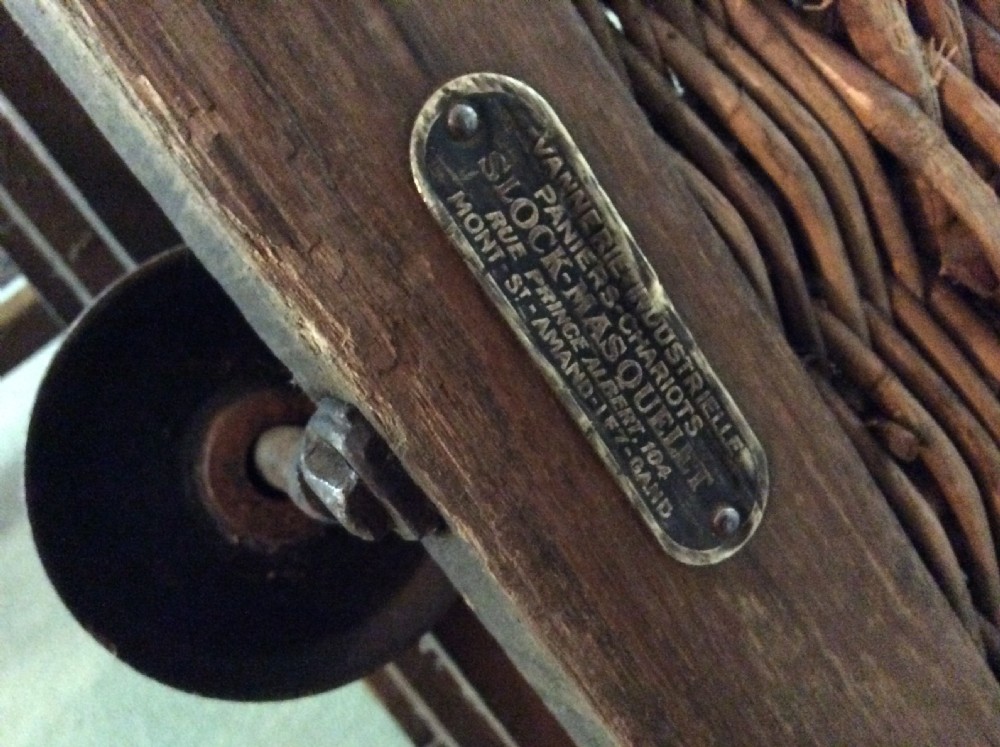 An early 20thC wheeled laundry basket  View II