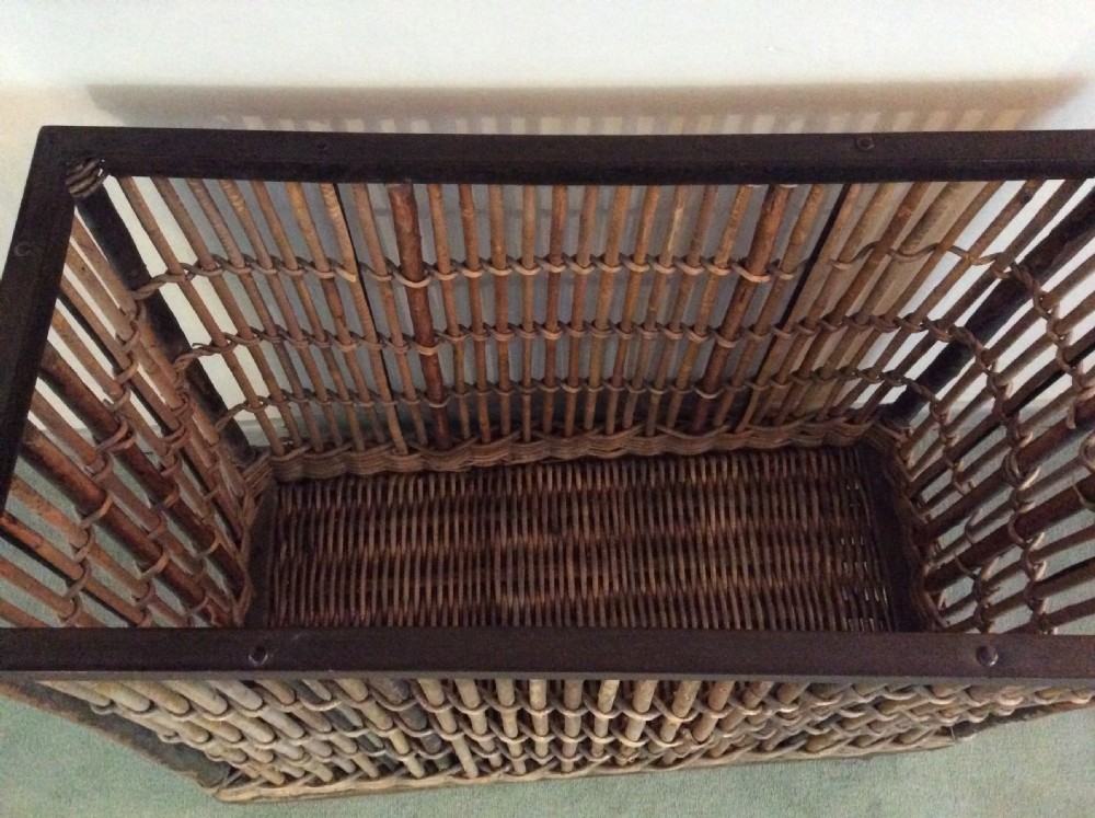 An early 20thC wheeled laundry basket  View IV