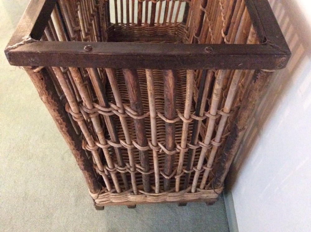 An early 20thC wheeled laundry basket  View VI