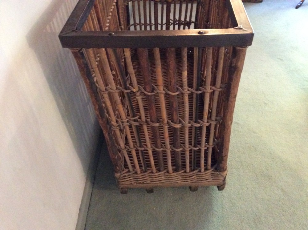 An early 20thC wheeled laundry basket  View IX