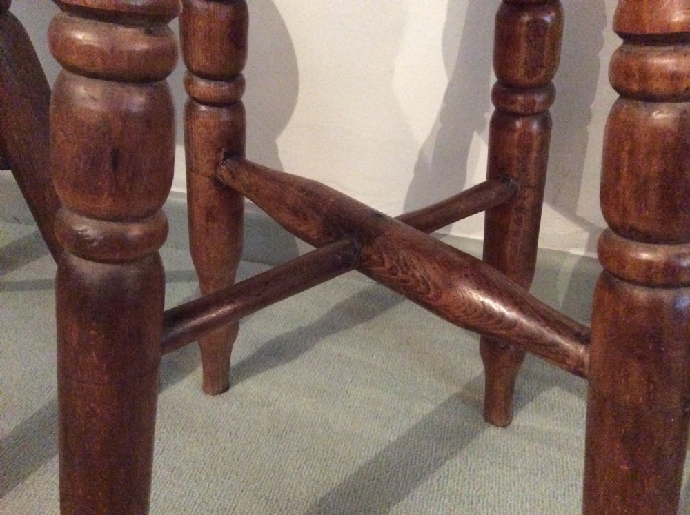 Two similar elm stools View V