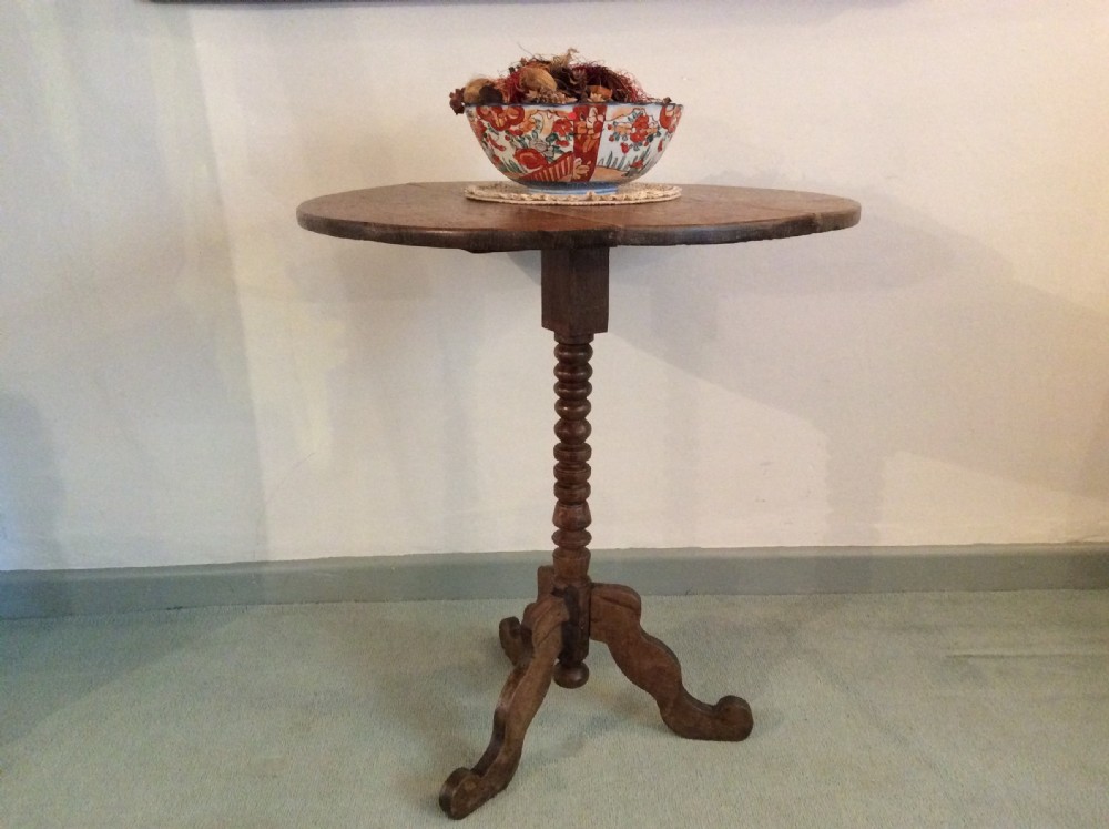An antique French oak tripod table View II