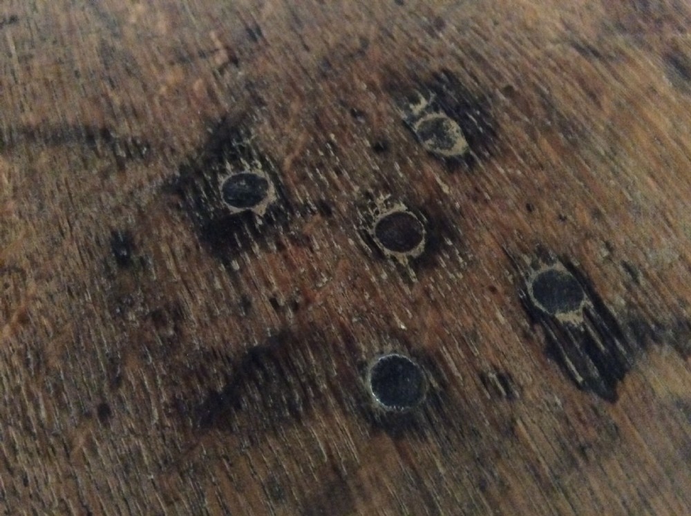 An antique French oak tripod table View IV