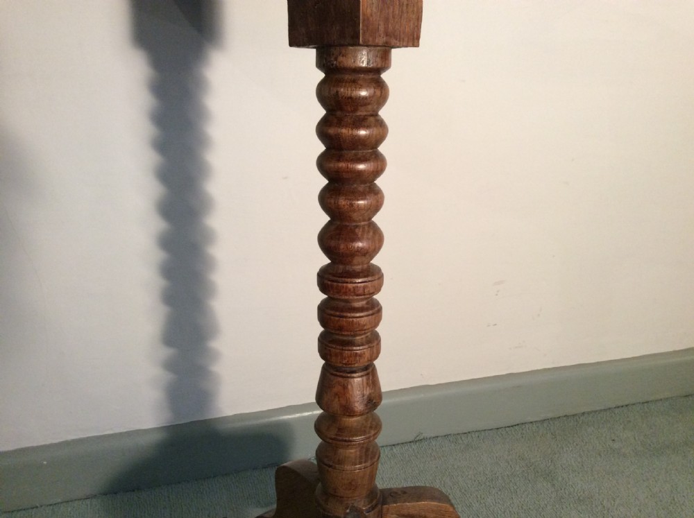 An antique French oak tripod table View V