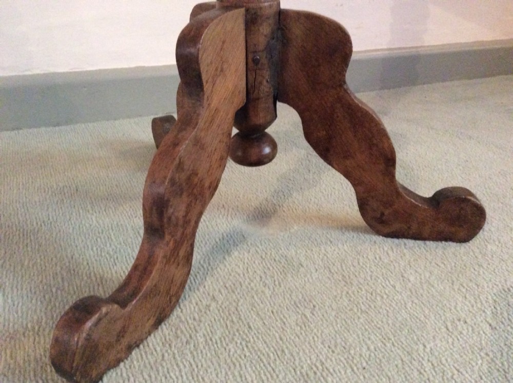 An antique French oak tripod table View VIII