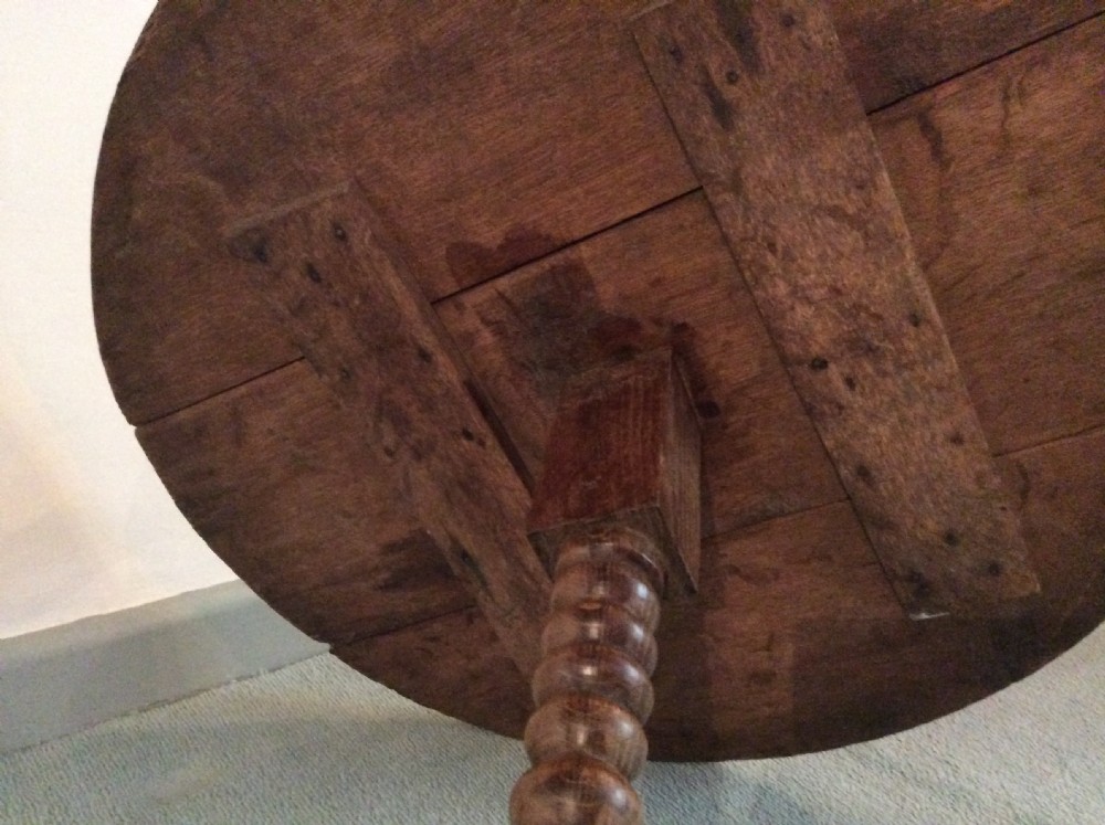 An antique French oak tripod table View XII