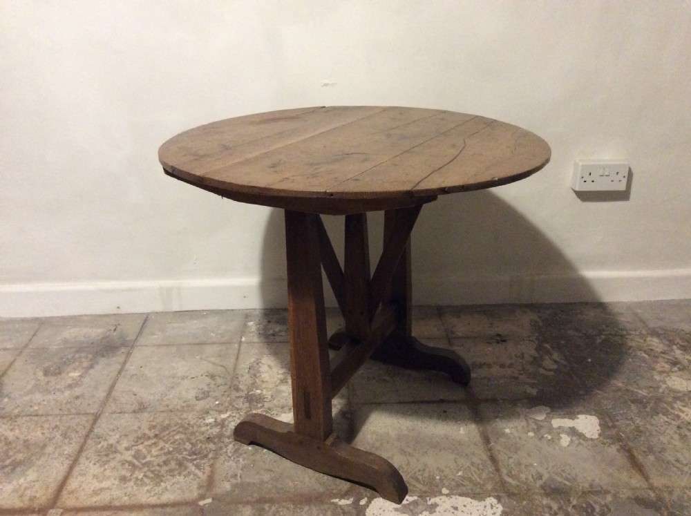 A 19thC  French oak wine tasting table