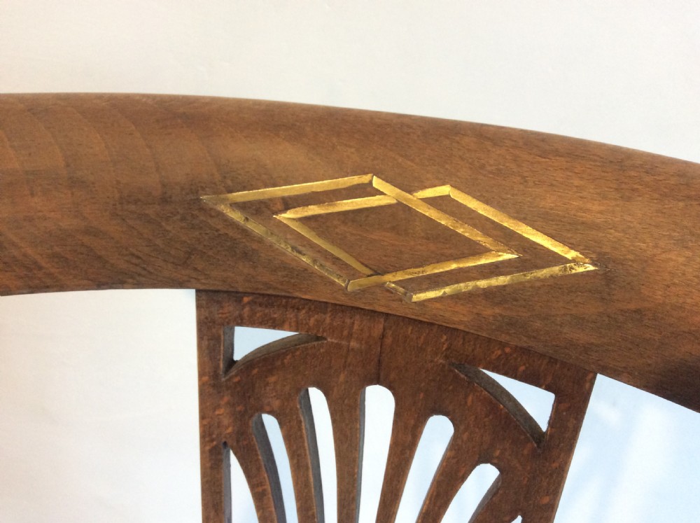 A pair of Edwardian open armchairs View II