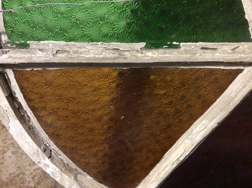 An architectural salvage circular segmented window View VII