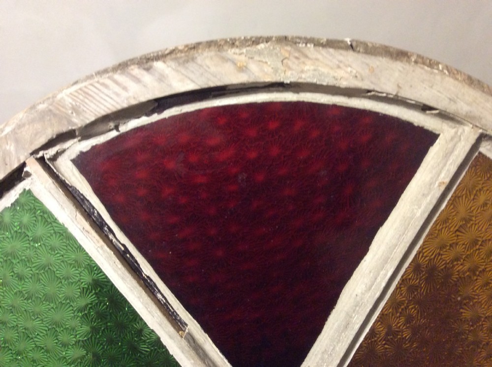 An architectural salvage circular segmented window View VIII